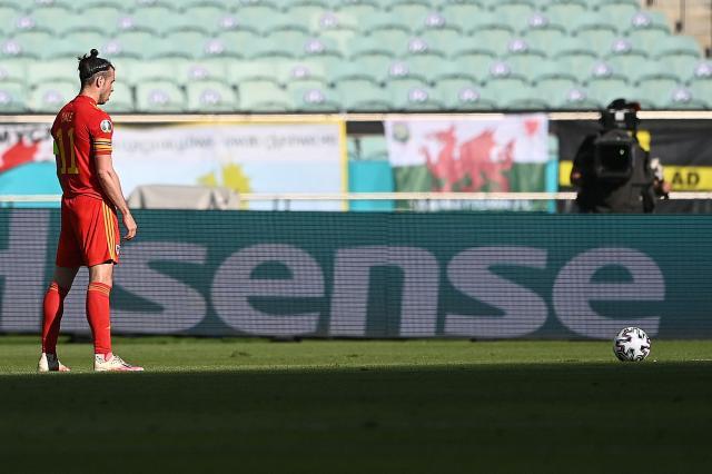 爱游戏游戏平台-威尔士惊险拿1分 贝尔“消失” 得赶快贴寻人启事！